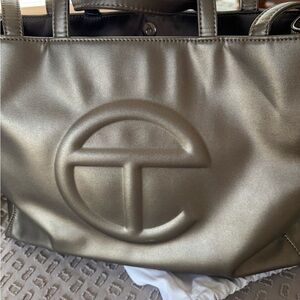 Telfar Gold Tote Bag with Embossed Logo and Structured Design